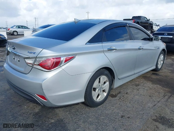2012 Hyundai Sonata Hybrid with VIN KMHEC4A46CA058307, listed as a IAAI auction lot 41814432 with 140,355 mi miles. Bid and sale history available at carsss.com. Image 4.