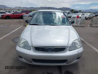 1999 Honda Civic LX with VIN JHMEJ6671XS003027, listed as a IAAI auction lot 41825146 with 197,764 mi miles and . Bid and sale history available at DreamBid. Image 12.