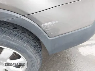 2013 Kia Sorento LX with VIN 5XYKTCA62DG313524, listed as a IAAI auction lot 41624883 with 70,777 mi miles. Bid and sale history available at carsss.com. Image 6.