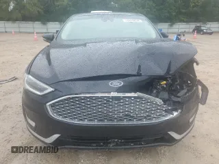 2019 Ford Fusion Titanium with VIN 3FA6P0K9XKR217324, listed as a Copart auction lot 56104185 with 135,728 mi miles and Salvage title. Bid and sale history available at DreamBid. Image 5.