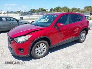 2016 Mazda CX-5 Touring with VIN JM3KE2CY6G0830409, listed as a IAAI auction lot 42049299 with 39,317 mi miles. Bid and sale history available at carsss.com. Image 17.