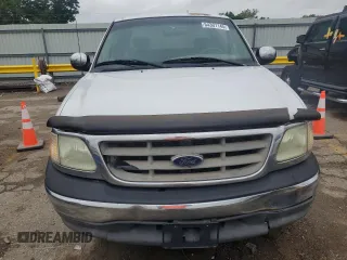 2002 Ford F-150 XL with VIN 1FTRX17L52KC49698, listed as a Copart auction lot 54307145 with 254,394 mi miles and Salvage title. Bid and sale history available at DreamBid. Image 5.