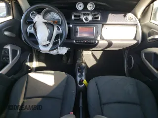 2011 Smart fortwo Pure with VIN WMEEJ3BA3BK432164, listed as a Copart auction lot 43130025 with 72,440 mi miles and Salvage title. Bid and sale history available at DreamBid. Image 8.