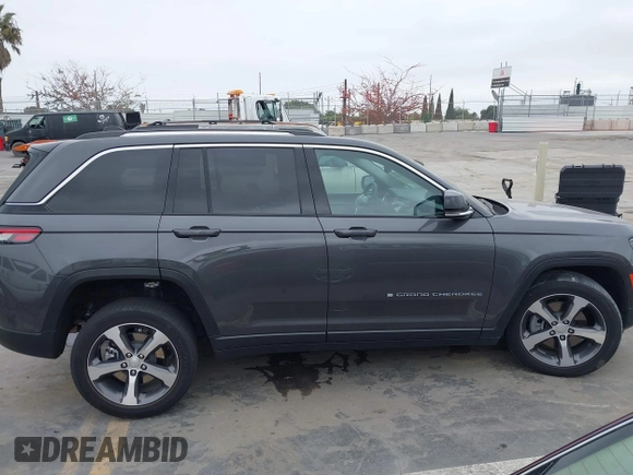 2022 Jeep Grand Cherokee with VIN 1C4RJYB68N8748802, listed as a IAAI auction lot 42158104 with 28,227 mi miles and . Bid and sale history available at DreamBid. Image 13.