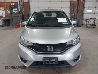2015 Honda Fit EX-L z VIN 3HGGK5H86FM714030, wystawiony jako IAAI lot #42388380 z przebiegiem 197 414 mil mil oraz . Historia ofert i sprzedaży dostępna na DreamBid. Obrazek 12.