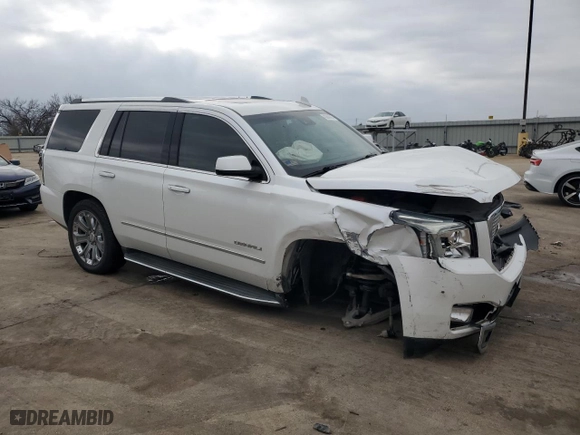 2016 GMC Yukon Denali with VIN 1GKS1CKJ1GR152053, listed as a Copart auction lot 43809865 with 98,145 mi miles and Salvage Title. Bid and sale history available at carsss.com. Image 4.