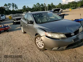 2010 Kia Forte EX with VIN KNAFU4A22A5055282, listed as a Copart auction lot 72369604 with Not Provided miles and Salvage Title. Bid and sale history available at carsss.com. Image 11.