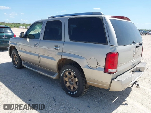 2005 Cadillac Escalade with VIN 1GYEK63NX5R141147, listed as a IAAI auction lot 42518716 with 231,540 mi miles and . Bid and sale history available at DreamBid. Image 3.