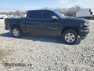 2018 Chevrolet Silverado 1500 LT with VIN 3GCUKREC3JG425552, listed as a Copart auction lot 46662535 with 122,469 mi miles and Salvage Title. Bid and sale history available at carsss.com. Image 4.