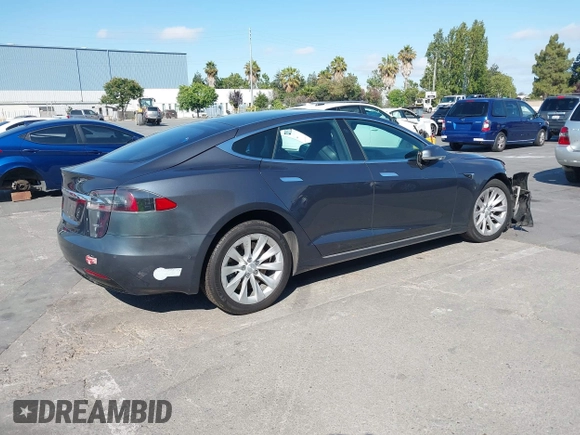 2018 Tesla Model S 75D with VIN 5YJSA1E26JF249573, listed as a IAAI auction lot 42748801 with 88,467 mi miles and . Bid and sale history available at DreamBid. Image 4.