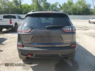 2019 Jeep Cherokee Trailhawk with VIN 1C4PJMBX0KD361639, listed as a Copart auction lot 60549865 with 95,888 mi miles and Salvage title. Bid and sale history available at DreamBid. Image 6.