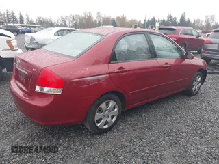 2009 Kia Spectra EX with VIN KNAFE222695621925, listed as a IAAI auction lot 40657622 with 135,647 mi miles. Bid and sale history available at carsss.com. Image 4.
