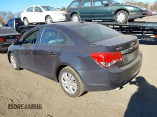 2014 Chevrolet Cruze LS z VIN 1G1PA5SGXE7195888, wystawiony jako IAAI lot #40807679 z przebiegiem 163 947 mil mil oraz . Historia ofert i sprzedaży dostępna na DreamBid. Obrazek 3.