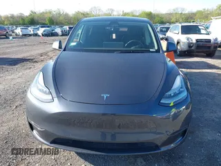 2021 Tesla Model Y Long Range with VIN 5YJYGAEE1MF149887, listed as a IAAI auction lot 42032104 with 54,932 mi miles. Bid and sale history available at carsss.com. Image 12.