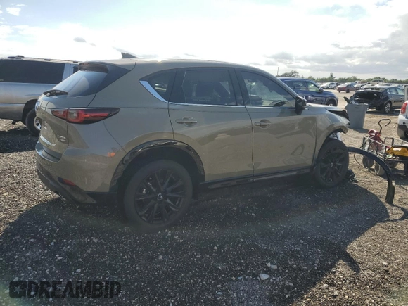 2024 Mazda CX-5 2.5 Carbon Turbo with VIN JM3KFBAYXR0521660, listed as a Copart auction lot 42415895 with 4,857 mi miles and Clean Title. Bid and sale history available at carsss.com. Image 3.