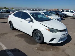 2015 Toyota Corolla L z VIN 5YFBURHE5FP272589, wystawiony jako IAAI lot #42146299 z przebiegiem 201 614 mil mil oraz . Historia ofert i sprzedaży dostępna na DreamBid. Obrazek 1.