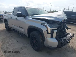 2023 Toyota Tundra SR5 with VIN 5TFLA5DAXPX063117, listed as a IAAI auction lot 42428620 with 60,409 mi miles and . Bid and sale history available at DreamBid. Image 1.