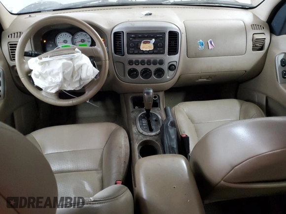 2005 Ford Escape Limited with VIN 1FMYU04145KA78041, listed as a Copart auction lot 70222184 with 113,943 mi miles and Salvage Title. Bid and sale history available at carsss.com. Image 8.