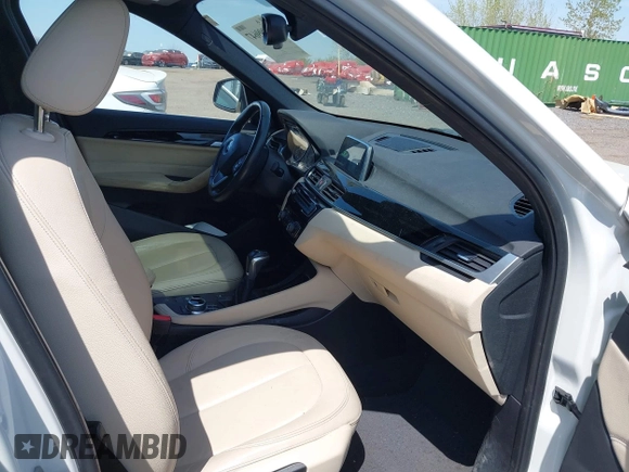 2018 BMW X1 xDrive28i with VIN WBXHT3C39J5F91912, listed as a IAAI auction lot 42099647 with 79,023 mi miles and . Bid and sale history available at DreamBid. Image 5.