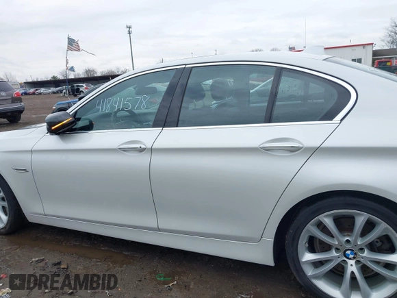 2014 BMW 5 Series 535i xDrive with VIN WBA5B3C50ED292545, listed as a IAAI auction lot 41841578 with 99,072 mi miles and . Bid and sale history available at carsss.com. Image 14.