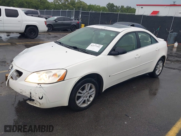2006 Pontiac G6 6-Cyl z VIN 1G2ZG558364172091, wystawiony jako IAAI lot #42377332 z przebiegiem 199 495 mil mil oraz . Historia ofert i sprzedaży dostępna na DreamBid. Obrazek 17.