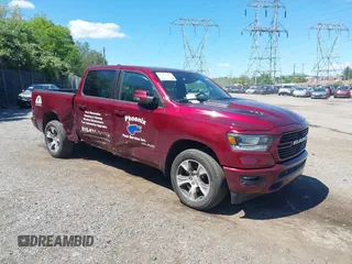 2024 Ram 1500 Laramie z VIN 1C6SRFJT7RN165612, wystawiony jako IAAI lot #42215665 z przebiegiem 47 156 mil mil oraz . Historia ofert i sprzedaży dostępna na DreamBid. Obrazek 1.