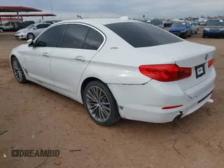 2018 BMW 5 Series 530e xDrive with VIN WBAJB1C55JB374652, listed as a IAAI auction lot 41812287 with 84,593 mi miles and . Bid and sale history available at carsss.com. Image 3.