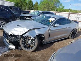 2018 Ford Mustang GT z VIN 1FA6P8CF4J5182655, wystawiony jako IAAI lot #42084037 z przebiegiem 57 987 mil mil oraz . Historia ofert i sprzedaży dostępna na DreamBid. Obrazek 15.