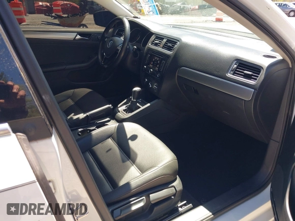 2015 Volkswagen Jetta SE with VIN 3VWD07AJ8FM284756, listed as a IAAI auction lot 42038453 with 127,112 mi miles and . Bid and sale history available at DreamBid. Image 5.