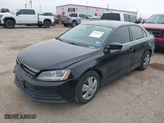 2017 Volkswagen Jetta 1.4T S with VIN 3VW2B7AJXHM319429, listed as a IAAI auction lot 41591369 with 114,956 mi miles. Bid and sale history available at carsss.com. Image 2.