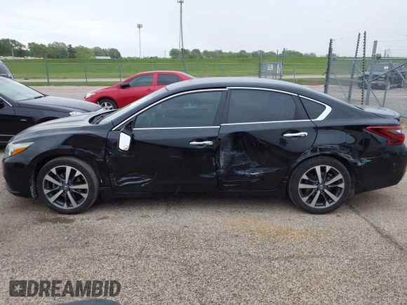 2017 Nissan Altima SR with VIN 1N4AL3AP7HC144654, listed as a IAAI auction lot 42152855 with 123,846 mi miles and . Bid and sale history available at DreamBid. Image 14.