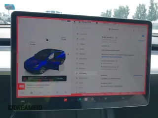 2023 Tesla Model Y Long Range z VIN 7SAYGDEE5PA102285, wystawiony jako IAAI lot #42402981 z przebiegiem 24 550 mil mil oraz . Historia ofert i sprzedaży dostępna na DreamBid. Obrazek 19.