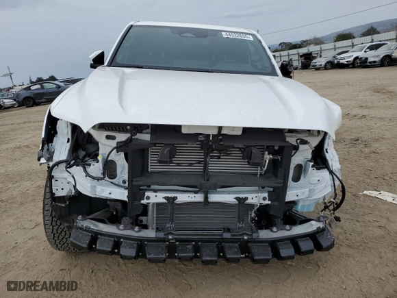 2024 Toyota Tacoma 4WD SR5 with VIN 3TMLB5JN0RM052088, listed as a Copart auction lot 44522655 with 2,921 mi miles and Salvage Title. Bid and sale history available at carsss.com. Image 5.