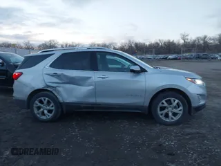 2019 Chevrolet Equinox Premier with VIN 2GNAXXEV1K6244691, listed as a IAAI auction lot 41164317 with 89,604 mi miles and . Bid and sale history available at DreamBid. Image 13.