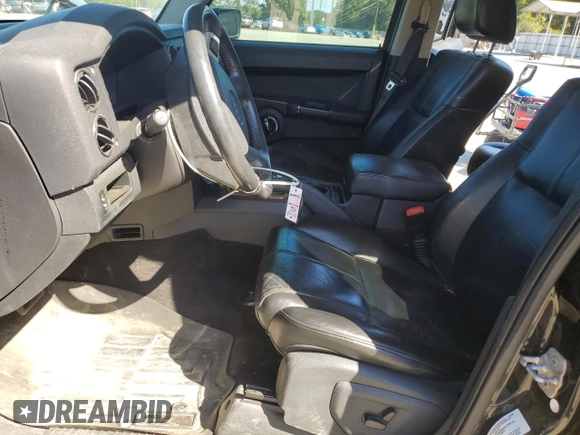 2010 Jeep Commander Limited z VIN 1J4RG5GT0AC153228, wystawiony jako Copart lot #75686884 z przebiegiem 178 715 mil mil oraz Szkoda całkowita • Salvage title. Historia ofert i sprzedaży dostępna na DreamBid. Obrazek 7.