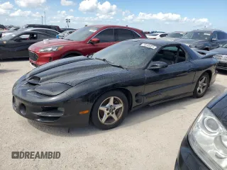 2000 Pontiac Firebird Formula z VIN 2G2FV22G9Y2140113, wystawiony jako Copart lot #76135324 z przebiegiem Nie podano mil oraz Szkody całkowita. Historia ofert i sprzedaży dostępna na DreamBid. Obrazek 1.