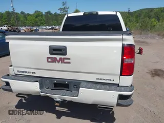 2015 GMC Sierra 1500 Denali with VIN 3GTU2WEJ7FG460695, listed as a IAAI auction lot 42023393 with 116,761 mi miles and . Bid and sale history available at DreamBid. Image 16.