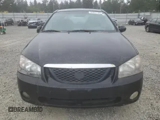 2005 Kia Spectra LX z VIN KNAFE121155165277, wystawiony jako Copart lot #55357155 z przebiegiem Nie podano mil oraz Czysty tytuł • Clean title. Historia ofert i sprzedaży dostępna na DreamBid. Obrazek 5.