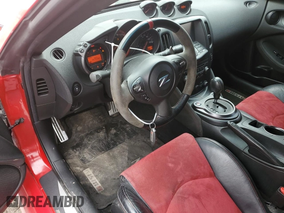 2015 Nissan 370Z z VIN JN1AZ4EH6FM442575, wystawiony jako Copart lot #57146915 z przebiegiem 57 020 mil mil oraz Czysty tytuł • Clean title. Historia ofert i sprzedaży dostępna na DreamBid. Obrazek 8.