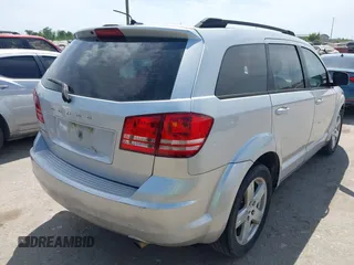 2014 Dodge Journey SE with VIN 3C4PDCAB0ET284437, listed as a IAAI auction lot 42063601 with 206,913 mi miles and . Bid and sale history available at carsss.com. Image 4.