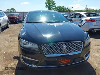 2017 Lincoln MKZ Reserve z VIN 3LN6L5E97HR650179, wystawiony jako IAAI lot #42366592 z przebiegiem 98 224 mil mil oraz . Historia ofert i sprzedaży dostępna na DreamBid. Obrazek 13.