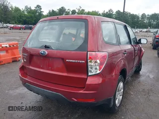 2010 Subaru Forester X with VIN JF2SH6AC0AH754937, listed as a IAAI auction lot 42636621 with Not provided miles and . Bid and sale history available at DreamBid. Image 4.