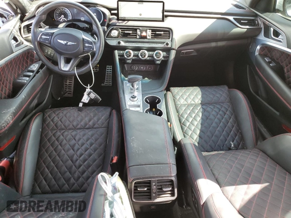 2023 Genesis G70 3.3T with VIN KMTG54TEXPU105082, listed as a Copart auction lot 65000724 with 12,941 mi miles and Salvage Title. Bid and sale history available at carsss.com. Image 8.