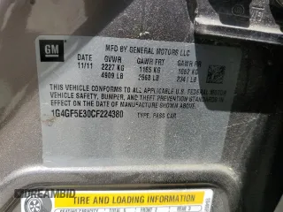 2012 Buick LaCrosse Premium 2 with VIN 1G4GF5E30CF224380, listed as a Copart auction lot 57233305 with 131,163 mi miles and Salvage title. Bid and sale history available at DreamBid. Image 12.