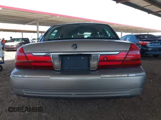 2003 Mercury Grand Marquis LS Premium with VIN 2MEFM75W23X613004, listed as a IAAI auction lot 41974625 with 151,023 mi miles and . Bid and sale history available at DreamBid. Image 16.