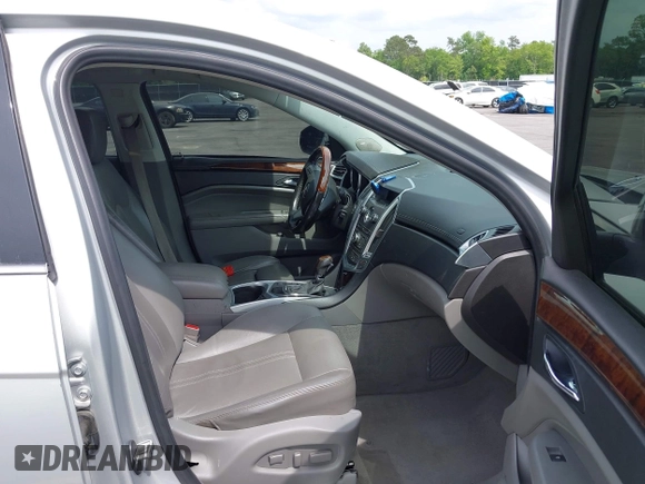 2011 Cadillac SRX Luxury Collection with VIN 3GYFNAEY5BS563048, listed as a IAAI auction lot 42031973 with 182,047 mi miles and . Bid and sale history available at DreamBid. Image 5.