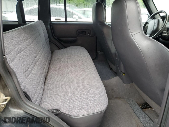 1999 Jeep Cherokee Sport with VIN 1J4FF68S8XL671341, listed as a Copart auction lot 58136475 with 139,848 mi miles and Salvage title. Bid and sale history available at DreamBid. Image 11.