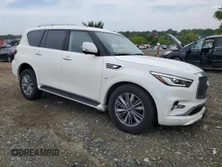 2019 Infiniti QX80 LUXE with VIN JN8AZ2NE6K9227058, listed as a Copart auction lot 64134284 with 89,785 mi miles and Salvage Title. Bid and sale history available at carsss.com. Image 4.