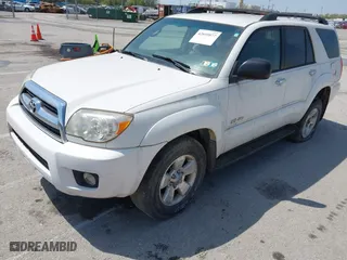 2006 Toyota 4Runner SR5 with VIN JTEBU14R768064604, listed as a IAAI auction lot 42059877 with 166,548 mi miles. Bid and sale history available at carsss.com. Image 2.