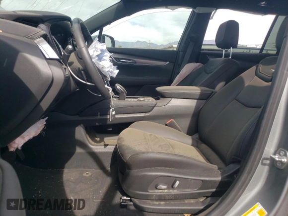 2024 Cadillac XT6 FWD Luxury with VIN 1GYKPAR46RZ748044, listed as a Copart auction lot 47118725 with 3,286 mi miles and Salvage title. Bid and sale history available at DreamBid. Image 7.